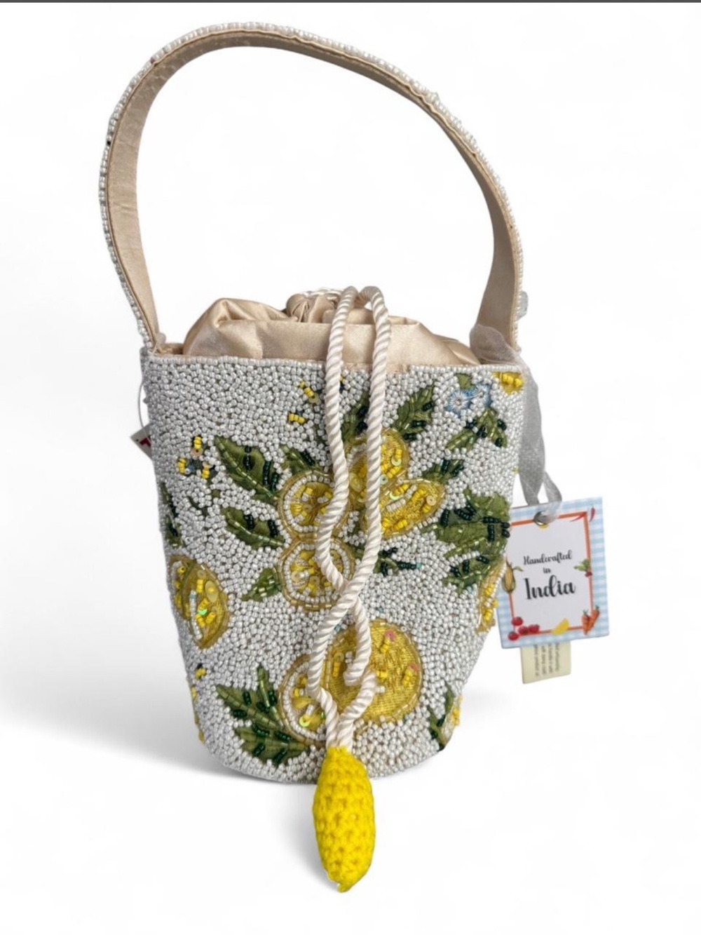 Made in India white beaded bucket bag with lemon design